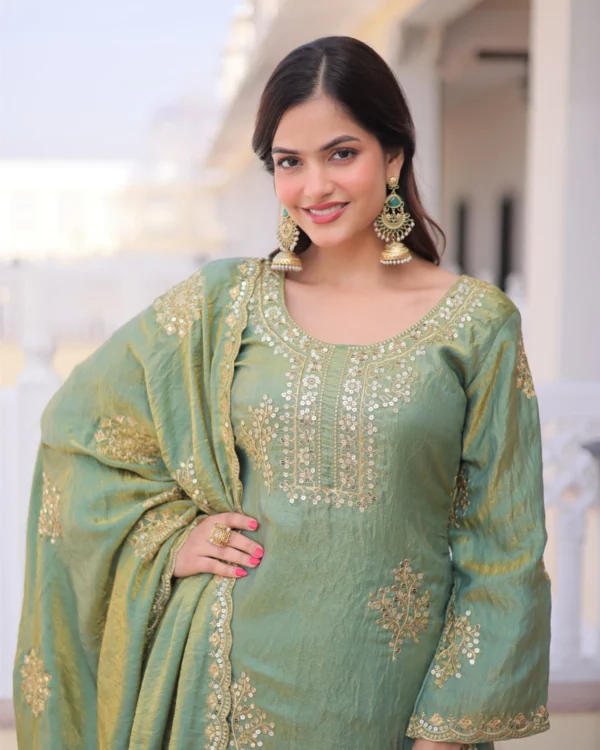 Close-up of zari sequins embroidered work on kurti