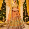 Mustard orange chaniya choli for haldi function with heavy embroidery